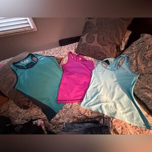 3 Work out tank tops women’s medium, lot of 3.